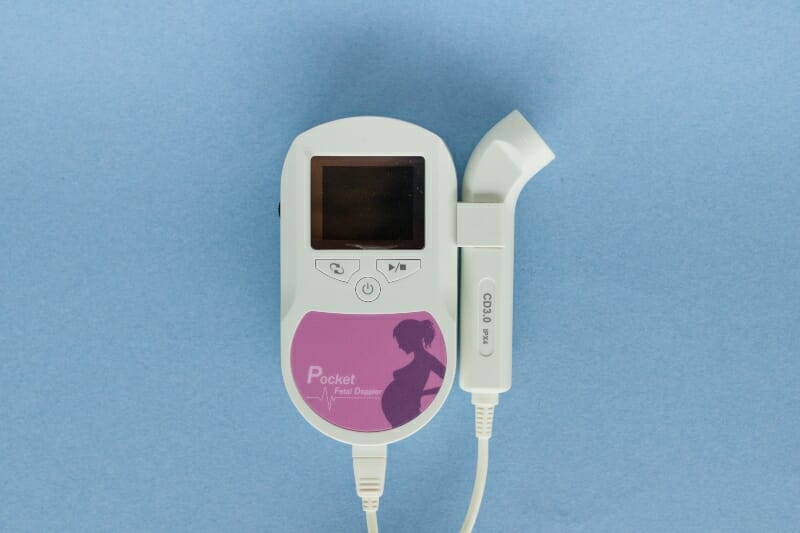 Doppler Fetal Para Escuchar En El Latido Del Corazón De Un Bebé Embarazada,  Primer, Fondo Rosado, Espacio De La Copia, Instrument Imagen de archivo -  Imagen de salud, ordenador: 131237063
